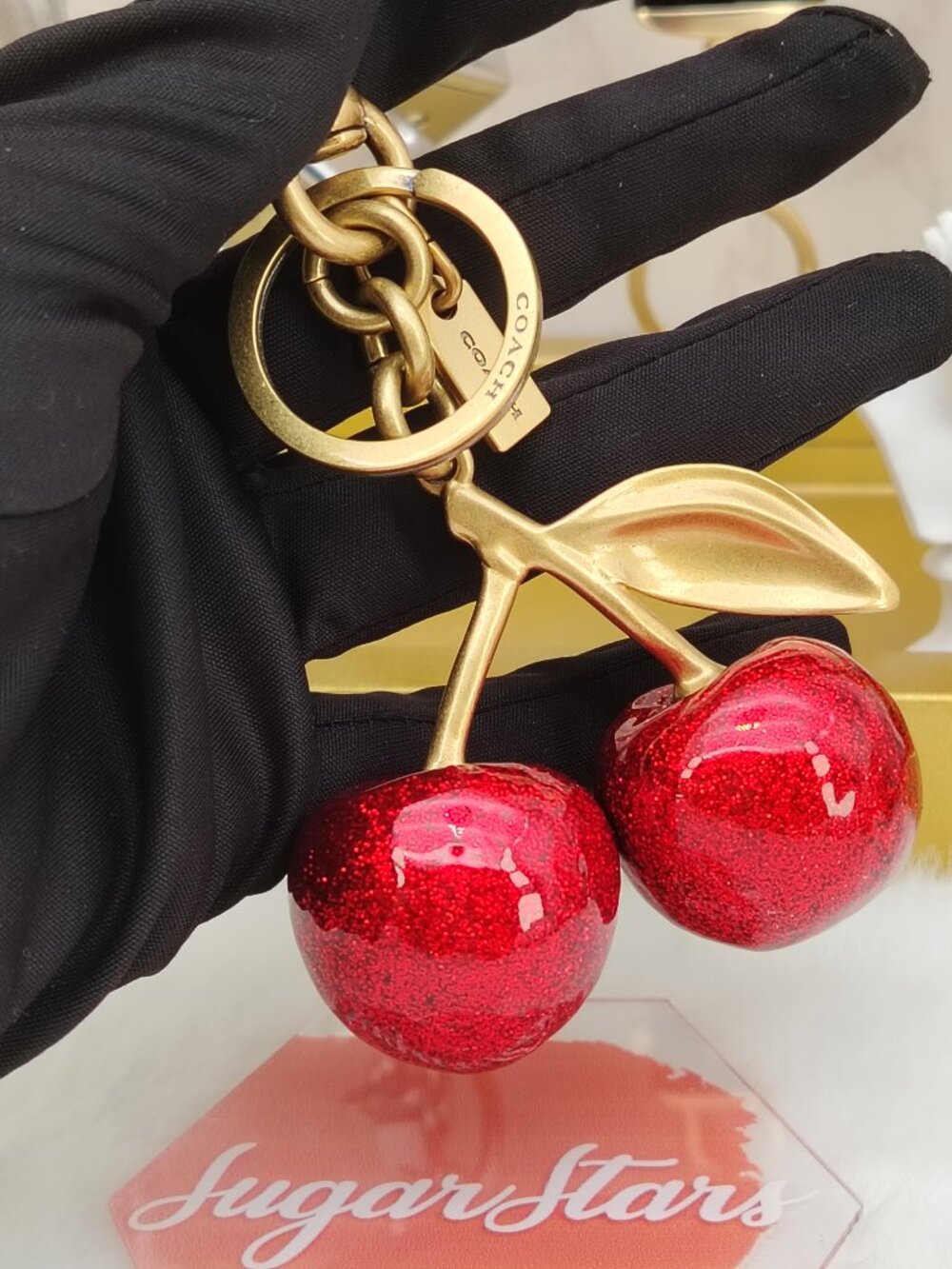 Coach red cherry bag charm